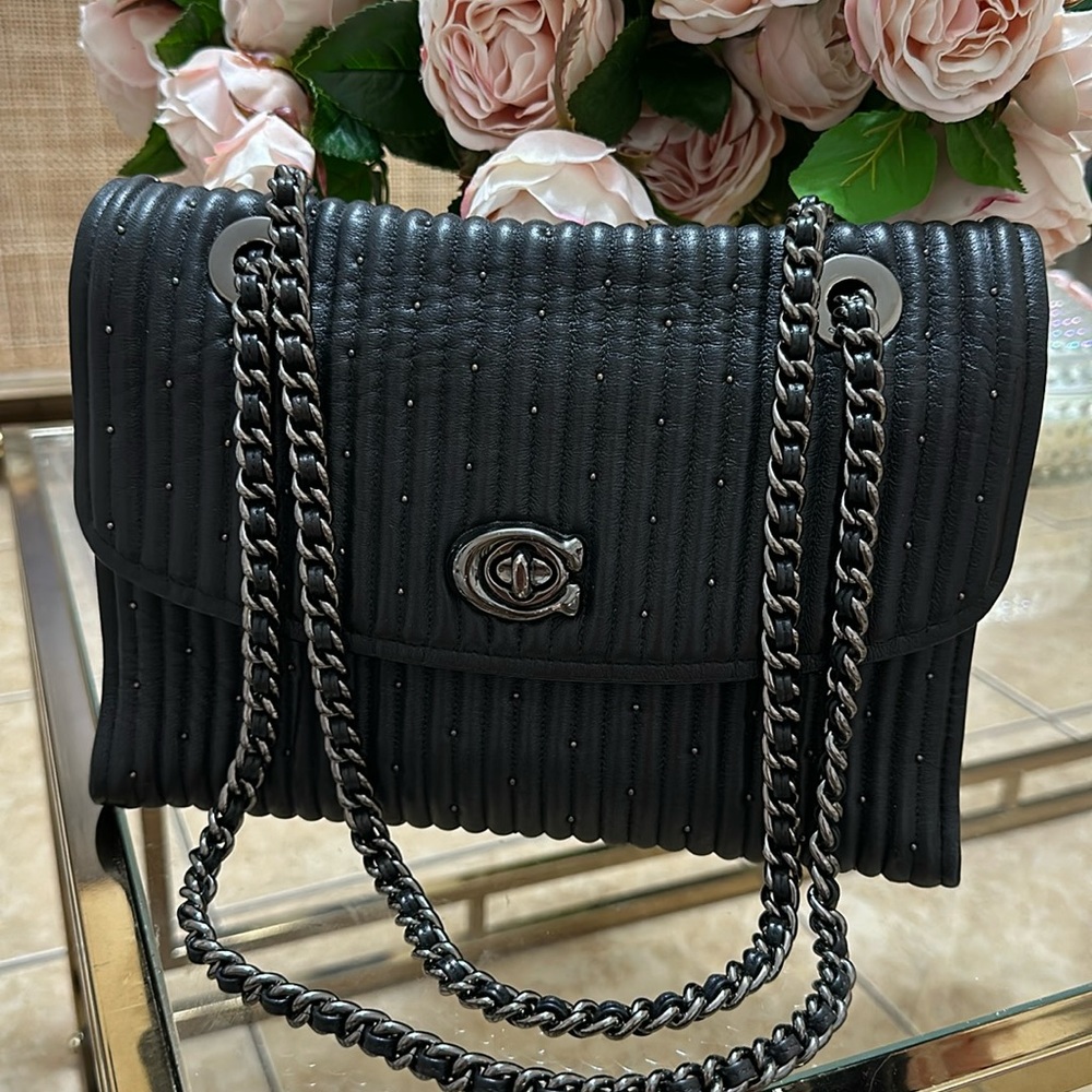 Coach Parker Quilting with studs details.